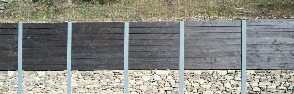 Mur composite bois pierre acier